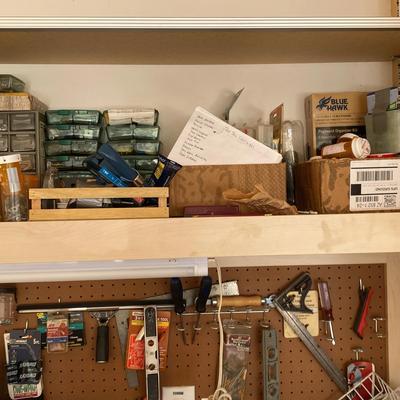 Work Bench Of Supplies And Tools For The Handiest Handyman