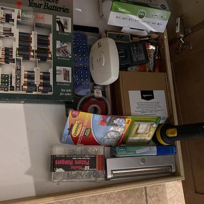 Battery Rack With Assortment If Batteries, Household Items And Lighting Items