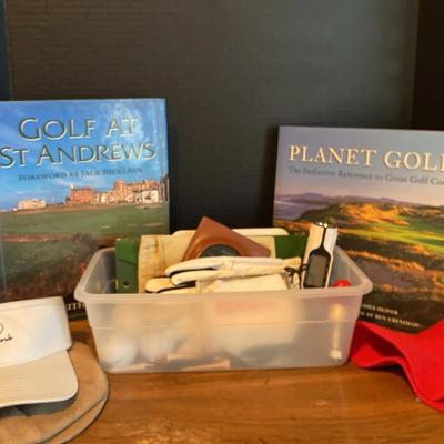 Golf Course Books With Golf Hats And Accessories Including Gloves, Trackers, And Balls And Pins