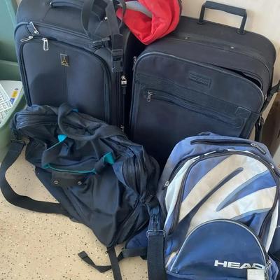 2 Travel Ready Black Suitcases, Head Backback and a few more carrying cases