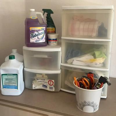The Basics For The Home - Cleaning Supplies And Simple Tools With Racks Of Rags