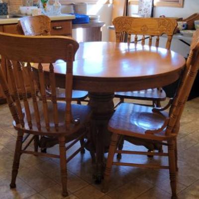 Sale Photo Thumbnail #25: Oak Clawfoot Table 
6 Chairs and 2 Leaves