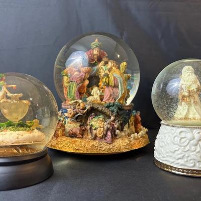 Three Snow Globes