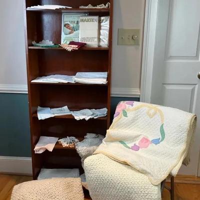 Vintage-Inspired Wooden Shelf with Linens and Quilts