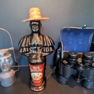 Vintage Collectibles Lot – Binoculars, Mini Lantern, and Rum Jumbie Empty Bottle