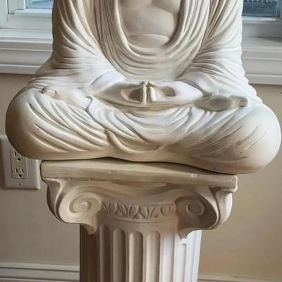 White Buddha Statue on Pedestal