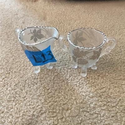 Two Flower Design Glass Collectibles