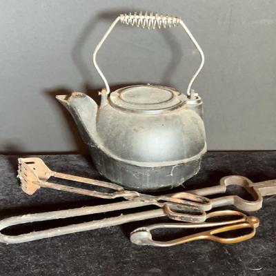 Cast-Iron Kettle And Tools
