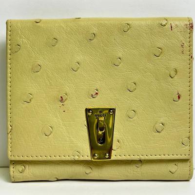 Authenticated Gucci Ostrich Leather Wallet - 4.75x.75x4.25"