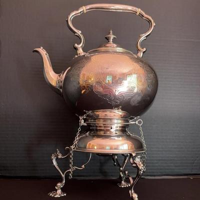 Tilting Teapot With Burner 