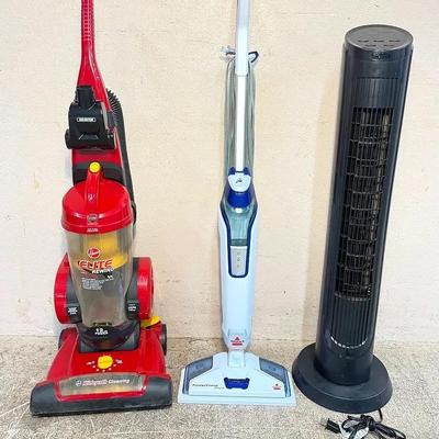 Household Cleaning & Cooling Lot – Hoover Upright Vacuum, Bissell Steam Mop, and Tower Fan