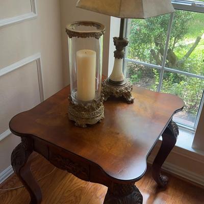 Small Table With Vintage Style Lamp And Candle