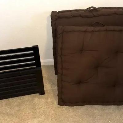Brown Cushions (2) and a Dark Colored Magazine/Book Holder