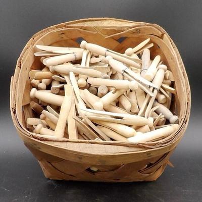 Basket Of 1920s Wood Clothes Pins