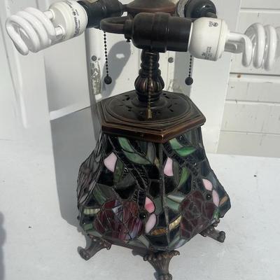  With leaded glass base 