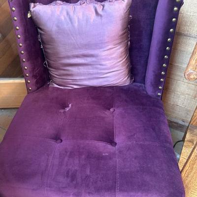 Tufted purple wingback chair