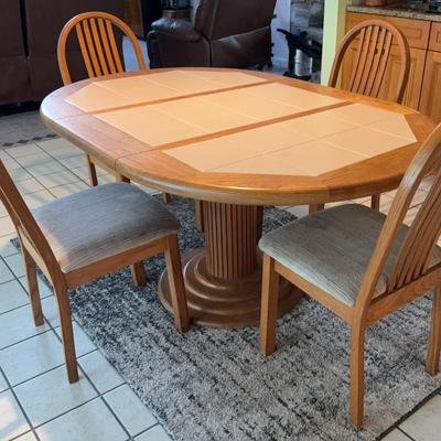 Wood & Tile Dining Set with 4 Upholstered Chairs + Area Rug