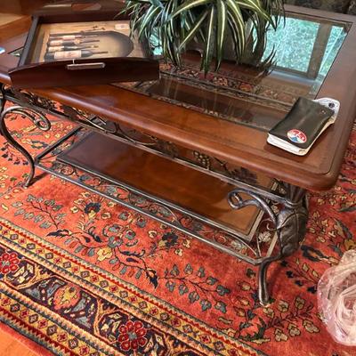 Sale Photo Thumbnail #110: Coffee table with leather trim around the top and on the bottom shelf