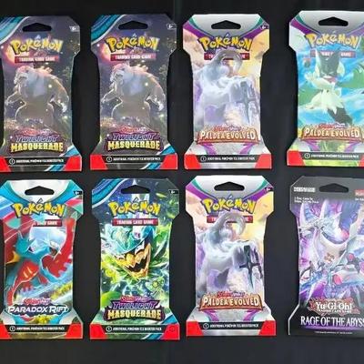 9 New Sealed Pokémon Packs, 1 Yu-gi-oh! Pack, & 1 Dragon Ball Trading Card Pack