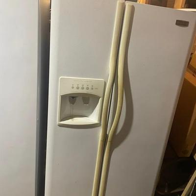 Frigidaire side-by-side refrigerator, in pearl white