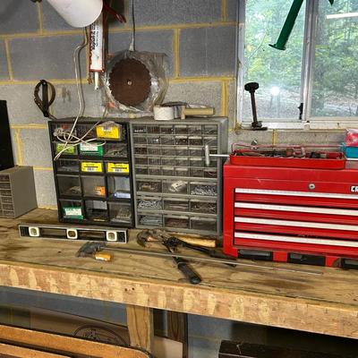 Tools And Contents On Garage Workbench 