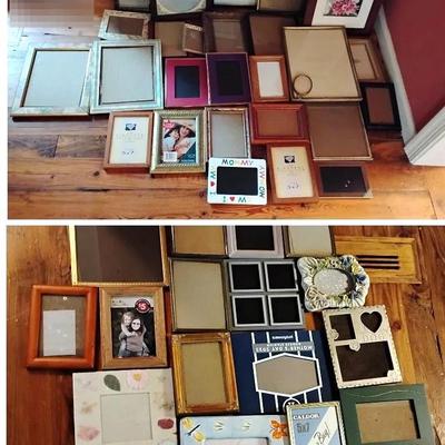 Dozens Of Photo Frames 