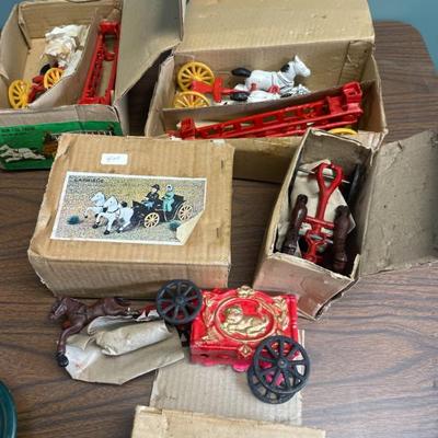 Cast iron toys in boxes