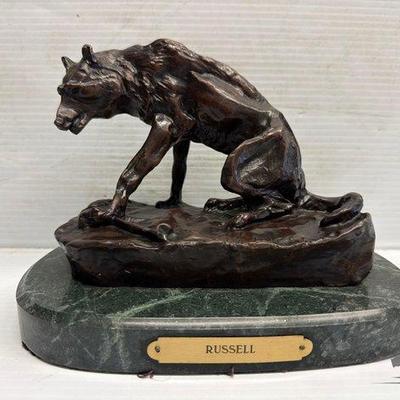 8125 • charles marion russell ”wolf with bone” bronze sculpture