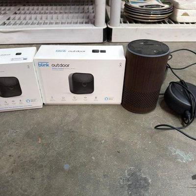 2392 • 2 blink security cameras and 2 amazon speakers