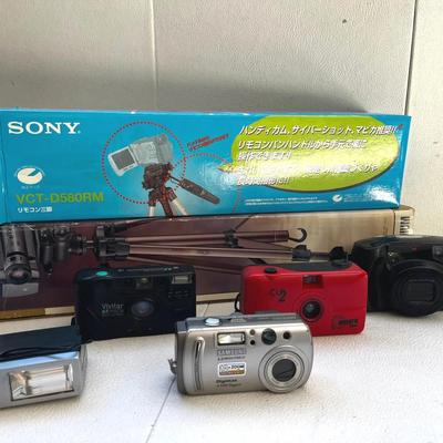 Samsung Digimax 4500 Super, Pentax Zoom 105 Super Digital Cameras, and Tripods