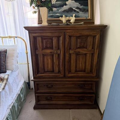 Short armoire with storage drawers