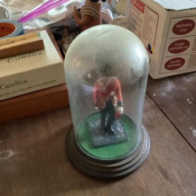 British figurines in glass dome