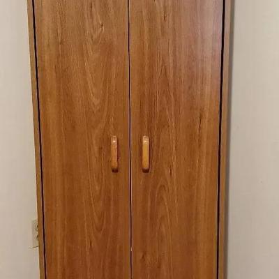 Tall Manufactured Wood Storage Cabinet 
