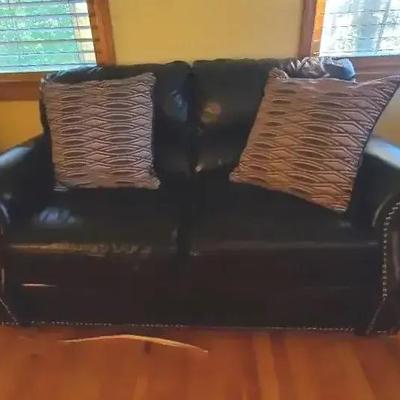 Dark Faux Leather Love Seat W/ (2) Pillows