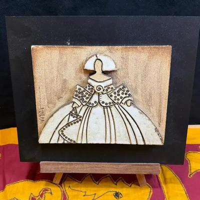 Ceramic art relief sculpture of a woman
