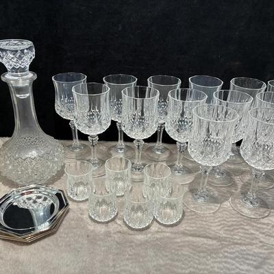 Crystal stemware decanter and silverplate coasters
