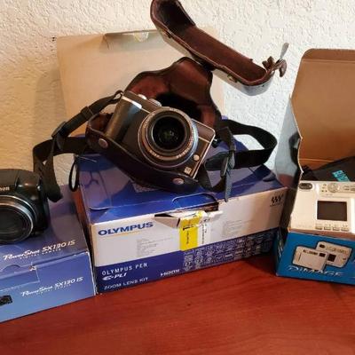 Po162 olympus canon, and minolta cameras