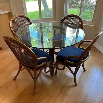 Po101 glass table and four chairs