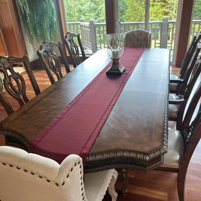 Formal dining table with extensions