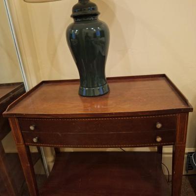 Antique accent table with drawers.  Lamp.