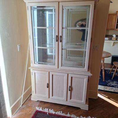 Medium size white wash china cabinet.