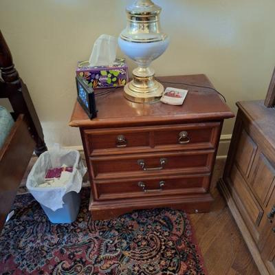 Nightstand.  Lamp.