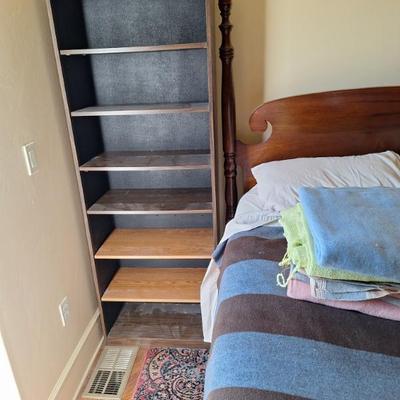 Bookshelf.  Bedding.