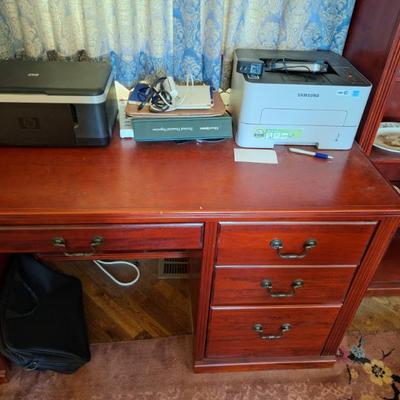 Office desk.  Printers.