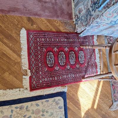 Woven throw rugs.