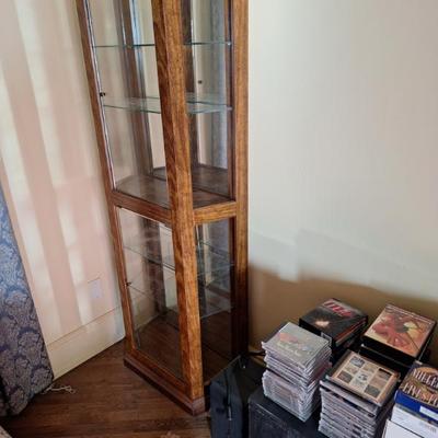 Solid oak curio cabinet.
