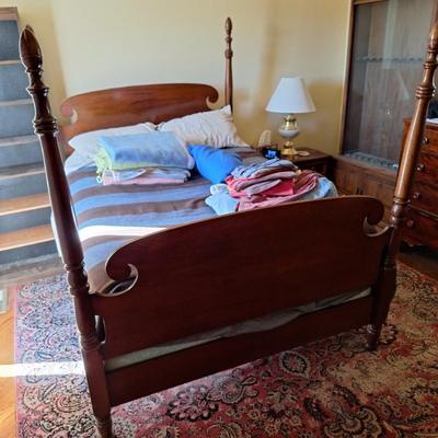 Vintage solid wood 4 poster twin bed.
