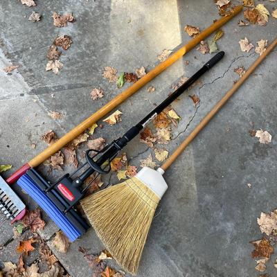 Lot With A Broom And Mop