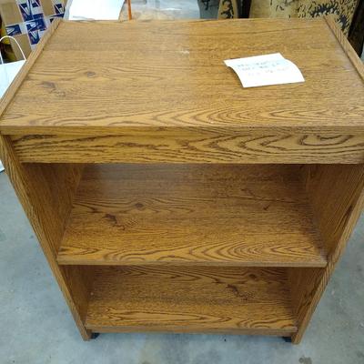 Small faux wood rolling shelf cart