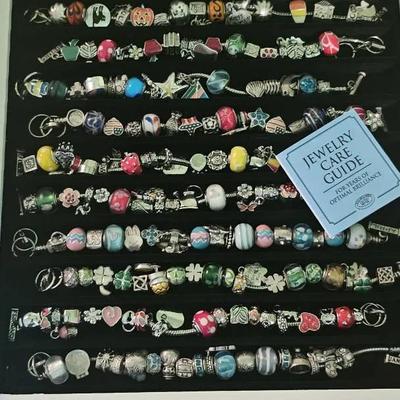 Large Collection of Charm Beads & Bracelets in Display Case